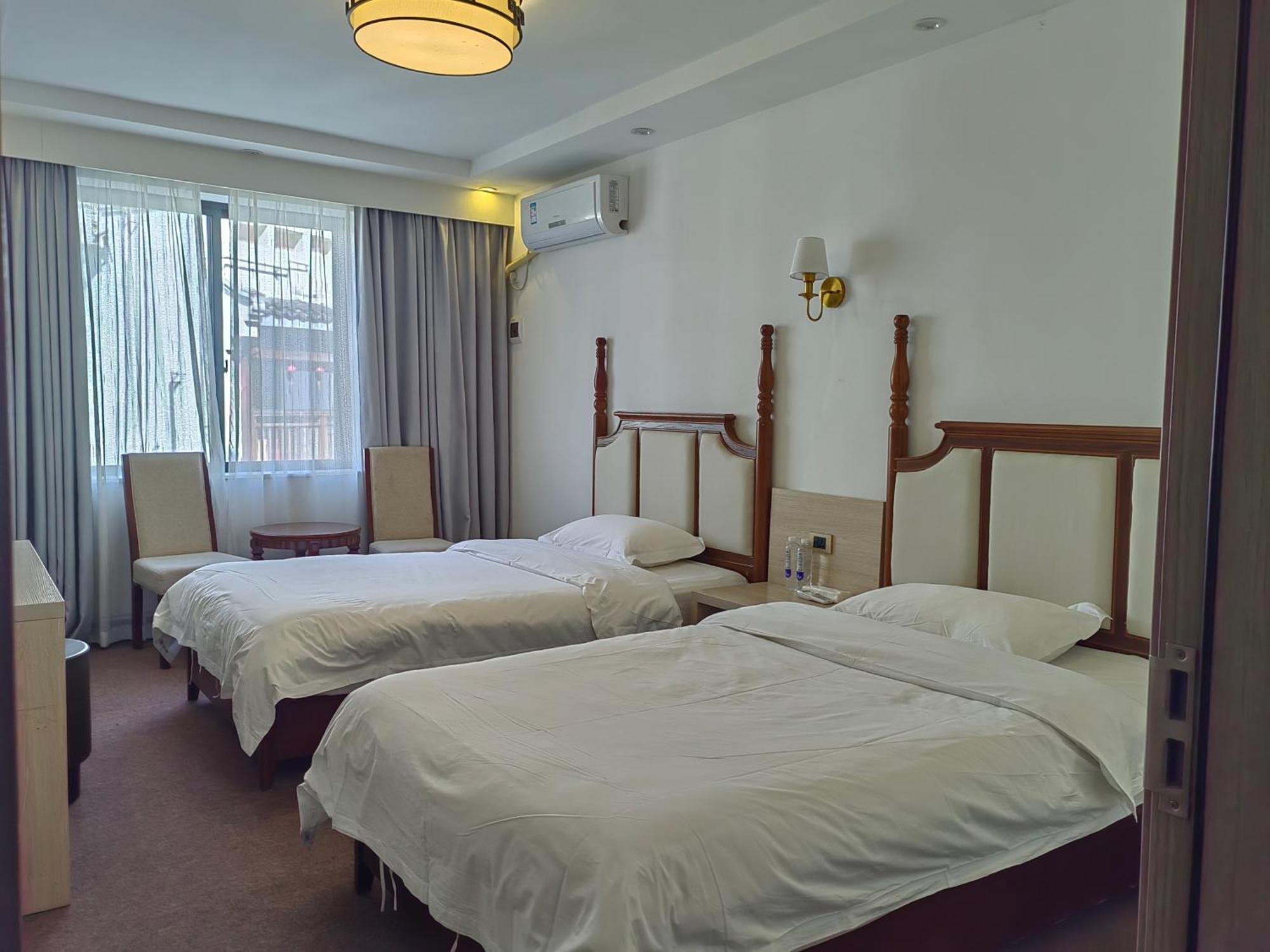 Serene Vale Inn Guilin-Free One Way Pick Up Service To High-Speed Railway Station For 2 Nights Quarto foto